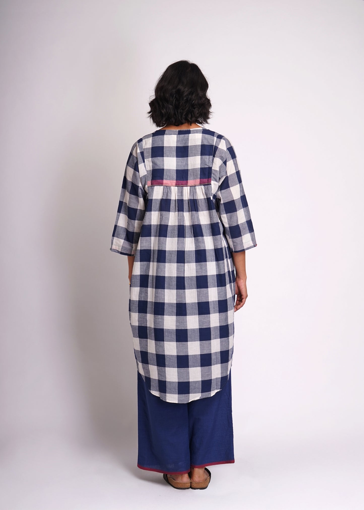 Lata: shirt dress in handwoven checks.