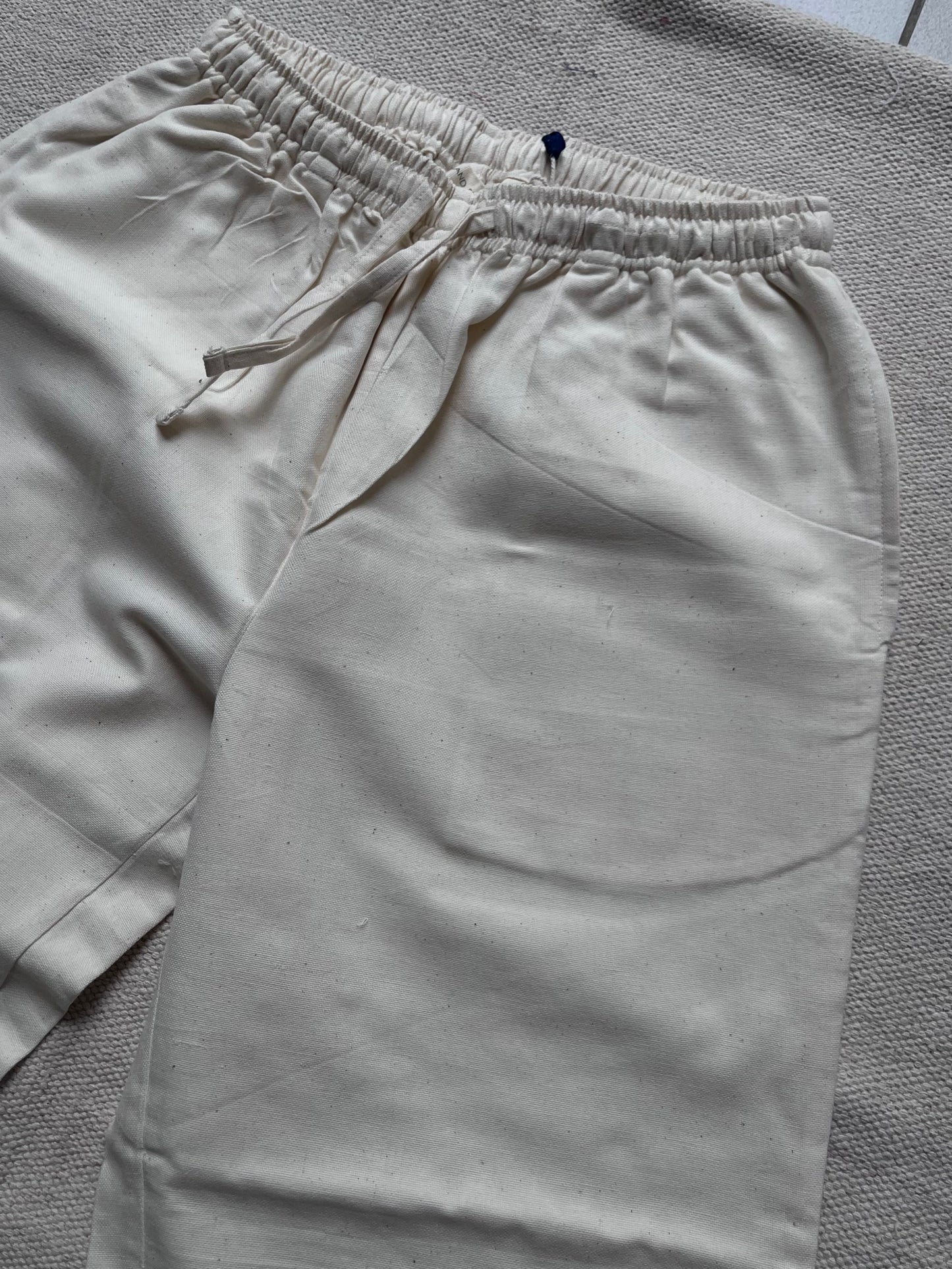 off white kora handwoven pants