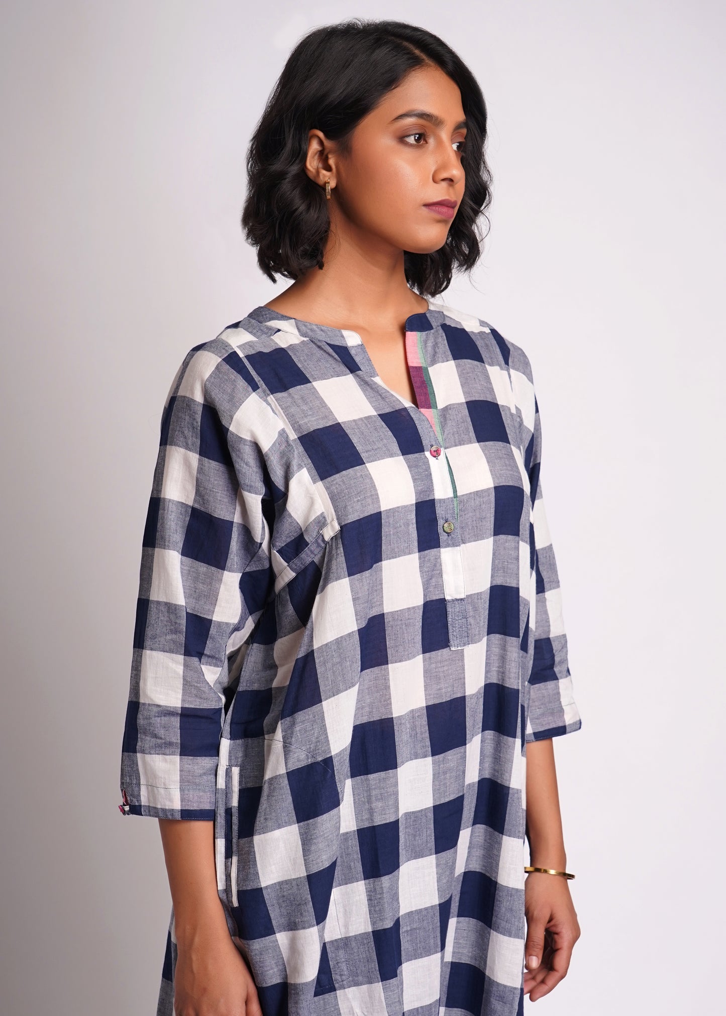 Lata: shirt dress in handwoven checks.