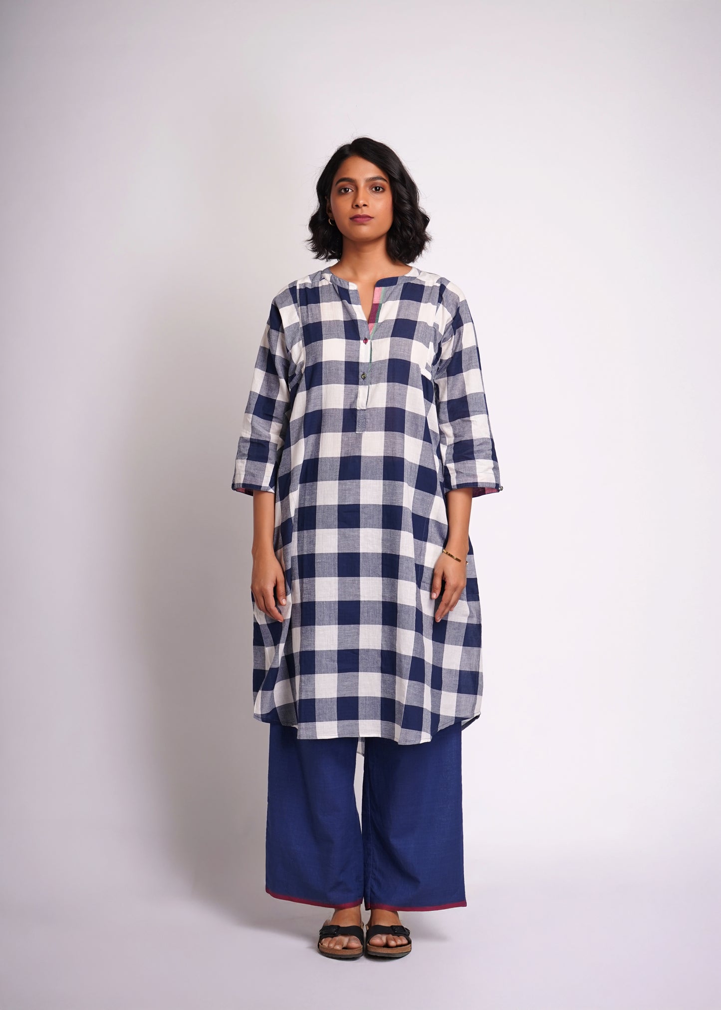 Lata: shirt dress in handwoven checks.