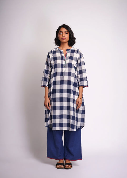 Lata: shirt dress in handwoven checks.