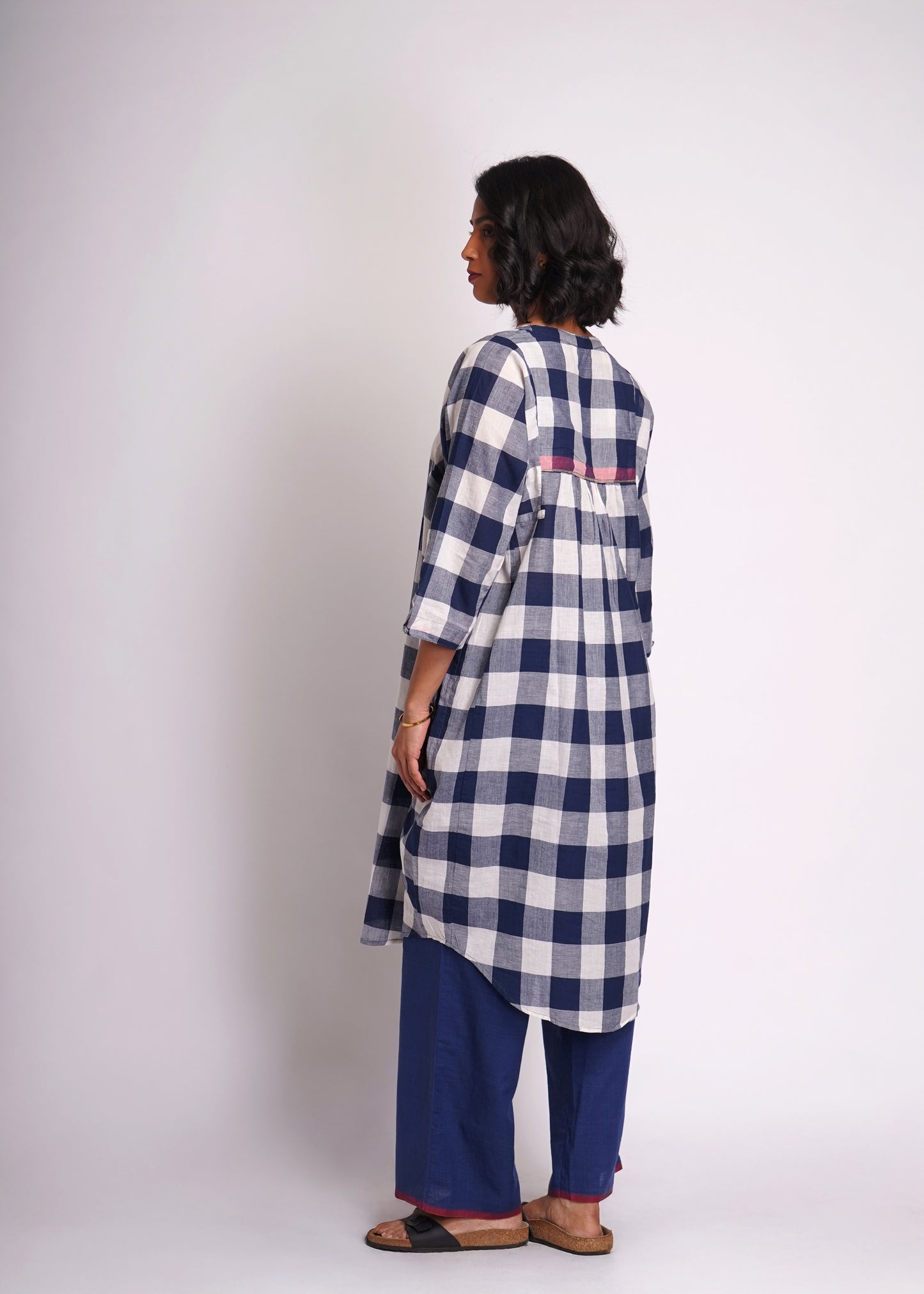 Lata: shirt dress in handwoven checks.